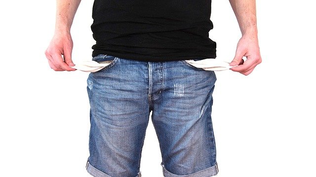 picture of man showing empty pockets