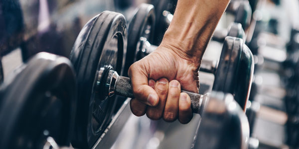 picture of man lifting dumbell