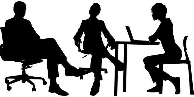 office workers in silhouette