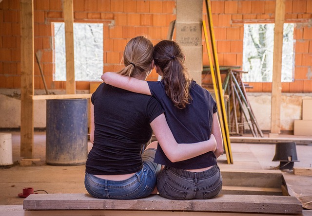 picture of ladies with their arms around each other